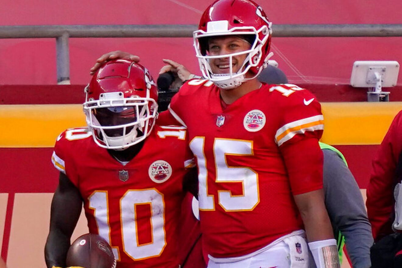Patrick Mahomes and Tyreek Hill celebrate after scoring a touchdown...