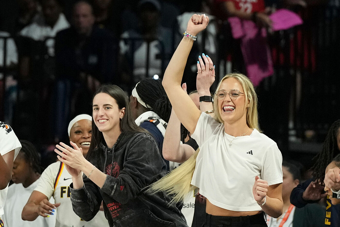 Indiana Fever guard Caitlin Clark;, front left, celebrates with Sophie...